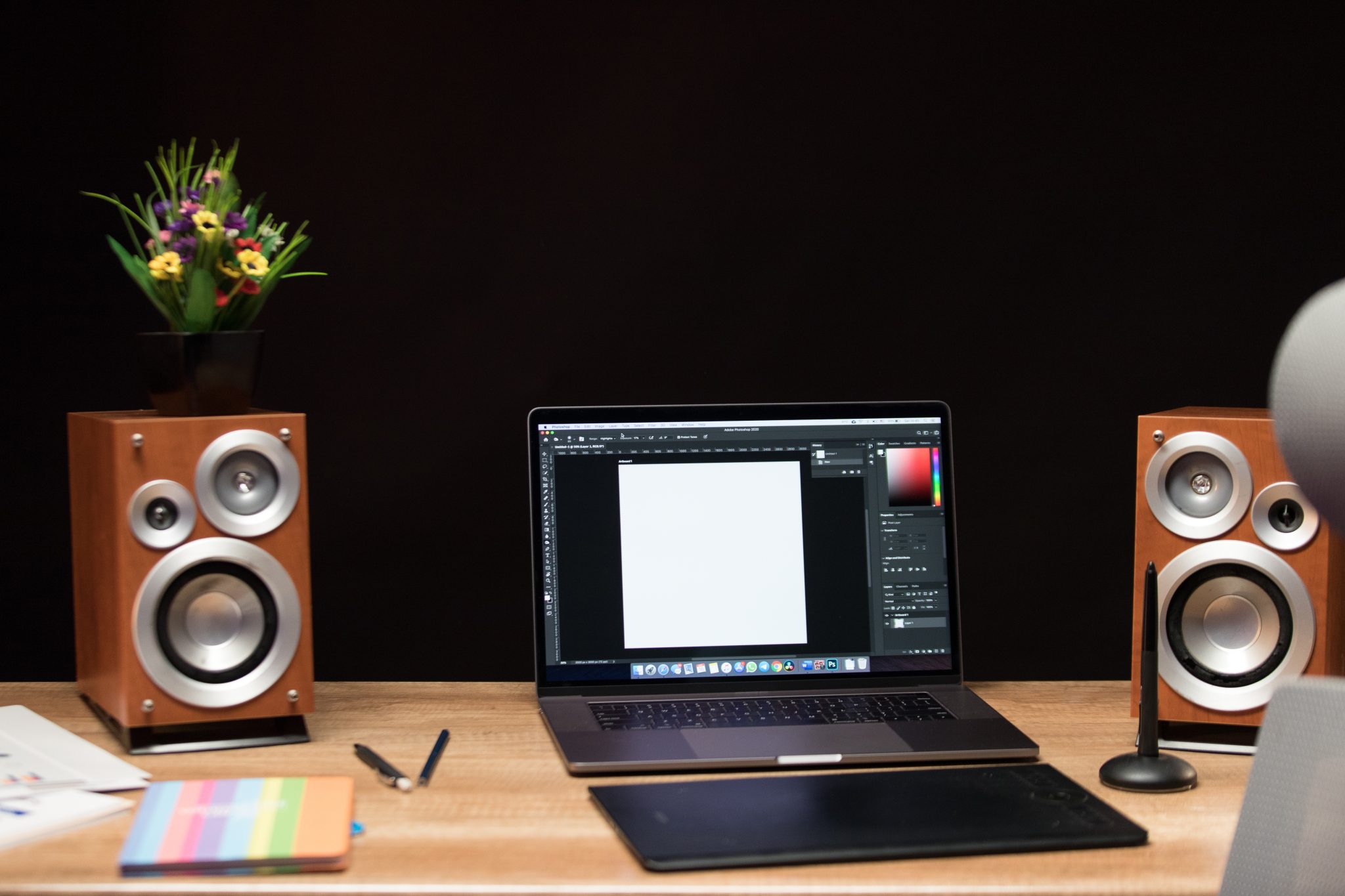 laptop-table-with-loudspeakers-flowers